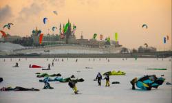 Snowkiting on the frozen Volga river  